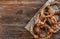 Top view of fresh baked tasty pretzels with sesame seeds. Selective focus on the pretzels