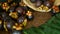 Top view of fresh delicious harvested mangosteens on wooden table. Thai organic purple fruit in the basket.