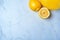 Top view of fresh lemons on kitchen marble. Antioxidant vitamin on white background