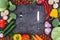 Top view of fresh organic assorted vegetables and fork with knife