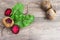 Top view at fresh organic beets with leaves on wooden rustic background. Close up view