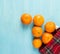 Top view. Fresh tangerines on a wooden background. Mandarins with copy space for text. Ripe and tasty tangerines. Clementines on