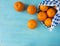 Top view. Fresh tangerines on a wooden background. Mandarins with copy space for text. Ripe and tasty tangerines. Clementines on