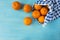 Top view. Fresh tangerines on a wooden background. Mandarins with copy space for text. Ripe and tasty tangerines. Clementines on