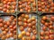 Top view of Fresh tomatoes in cardboard crates