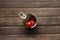 Top view of fresh whole tomatoes in the opened metal can on the wooden table.Fresh ingredients and producing organic tomato paste