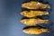 Top view of fried tench fish served on slate background, close u