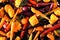 Top view full background of colorful roasted autumn vegetables