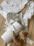 Top view of a Ginger Kitten, mixed-breed cat, playing with soft paper