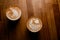 Top view of glasses of coffee with latte art with beautiful coffee milk foam