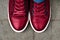 Top view of glossy sneakers,red color of year 2023