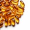 Top view of Gold fish oil isolated for good health on white background. Supplementary food. Omega 3. Vitamin E. Capsules