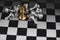 Top view gold king chess with silver chess pawns pieces on chess board game competition