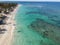 He top view of a gorgeous beach. Blue ocean on a sunny day