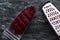 Top view of grated cooked beet in plastic grater bowl and grater