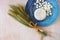 Top view of greek cheese and bulgarian cheese on wooden table over wooden textured background. Symbols of jewish holiday - Shavuot