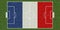 Top view of Green grass soccer field with flag of France. football background. 3d illustration