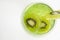 Top view of a green kiwi glass drink
