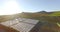 Top view, greenhouse and countryside with agriculture, farm and industry with lens flare, sunshine and nature. Empty