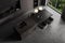 Top view of grey home kitchen interior with cooking zone and dinner table
