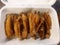 Top view of group fried chicken wings on plate as a background in restaurant