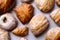 Top view of a group of homemade puff pastries with sprinkled sugar powder