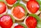 Top view for group of mini tarts with slices of strawberry and kiwi