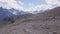 Top view of group of tourists resting on mountain route. Clip. Climbers sat down to relax in mountains on background of