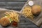 top view of hamburgers, french fries and sauces on baking paper