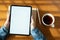 Top view hand of asian women  using tablet on wood table