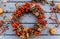 Top view of handmade colorful floral autumn door wreath