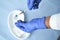 Top view of hands in protective gloves with vaccination equipment