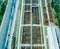 Top view of hangars. Hangar of galvanized metal sheets for the storage of agricultural products and storage equipment