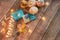 Top view of the Hanukkah Menorah celebration of candles with gifts and lights on a wooden table