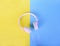 Top view of headphones on pastel background