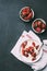 top view of healthy cottage cheese and fresh ripe strawberries in bowls