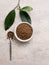 Top view of healthy soba tea and groats of tartary buckwheat  Ku Qiao seeds on light background. Flat lay. Copy space