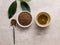 Top view of healthy soba tea and groats of tartary buckwheat  Ku Qiao seeds on light background. Flat lay. Copy space