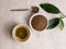 Top view of healthy soba tea and groats of tartary buckwheat  Ku Qiao seeds on light background. Flat lay. Copy space