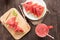 Top view healthy watermelon smoothie on a wood background