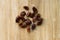 Top view of heap of dates fruit on the wooden background