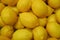 Top View of Heap of Vibrant Yellow Lemons for Background