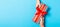 Top view of holding a gift in female and male hands on colorful background. Woman and man give and receive a present. Time for