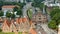 Top view of Holsten Gate or Holstentor and Salzspeicher warehouses in old town, beautiful architecture, sunny day, Lubeck, Germany