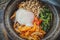 Top view of Homemade Bibimbap rice in pot.