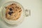 Top view of homemade delicious chocolate chip cookies in the glass jar ready for easy morning meal or a snack for coffee with copy