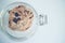 Top view of homemade delicious chocolate chip cookies in the glass jar ready for easy morning meal or a snack for coffee with copy