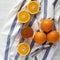 Top view, homemade orange marmelade on a white wooden surface. Flat lay, overhead, from above. Closeup