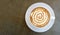 Top view of hot coffee cappuccino latte art top view on concrete background