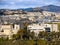 Top view of the house, the mountains, Acropolis and Likavitos Hill and the urban architecture of Athens on a sunny day